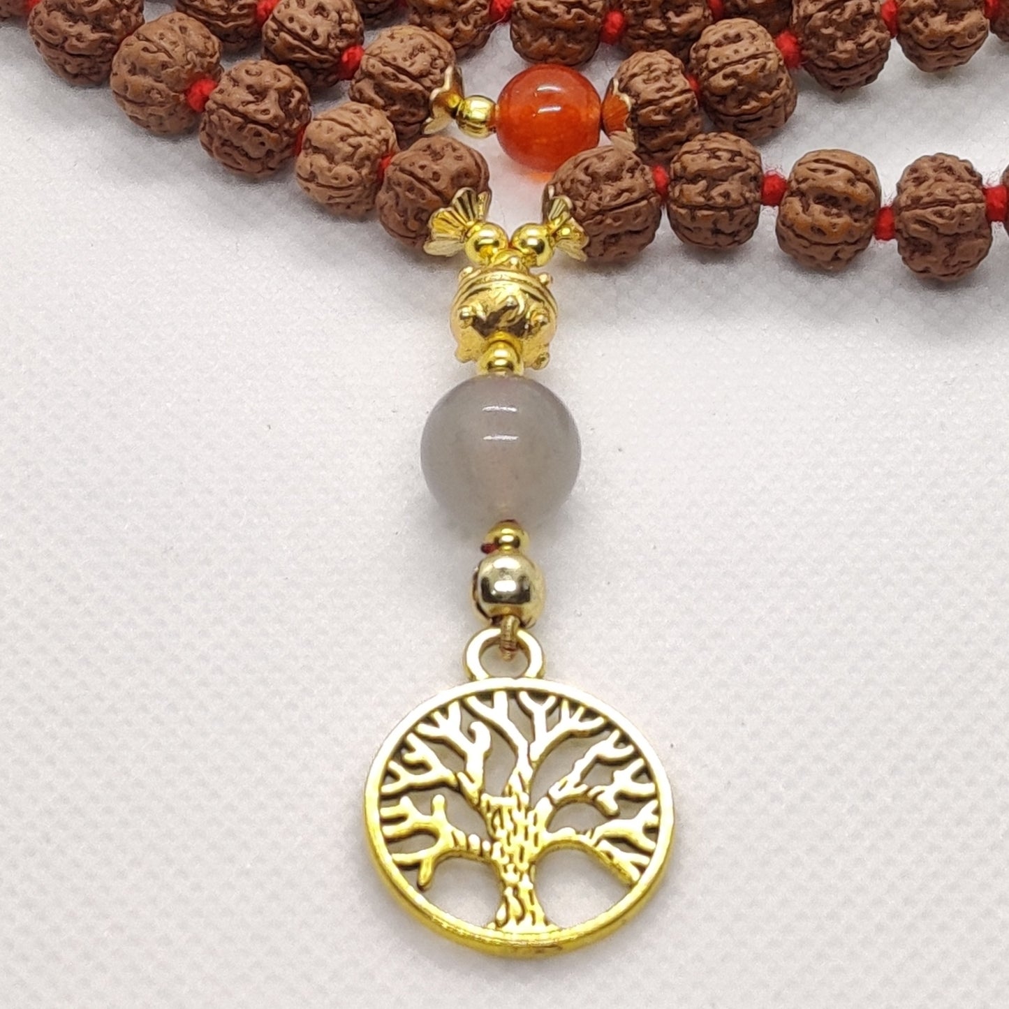 Harmony Unveiled: 7 Chakra Rudraksha Mala with Tree of Life Pendant