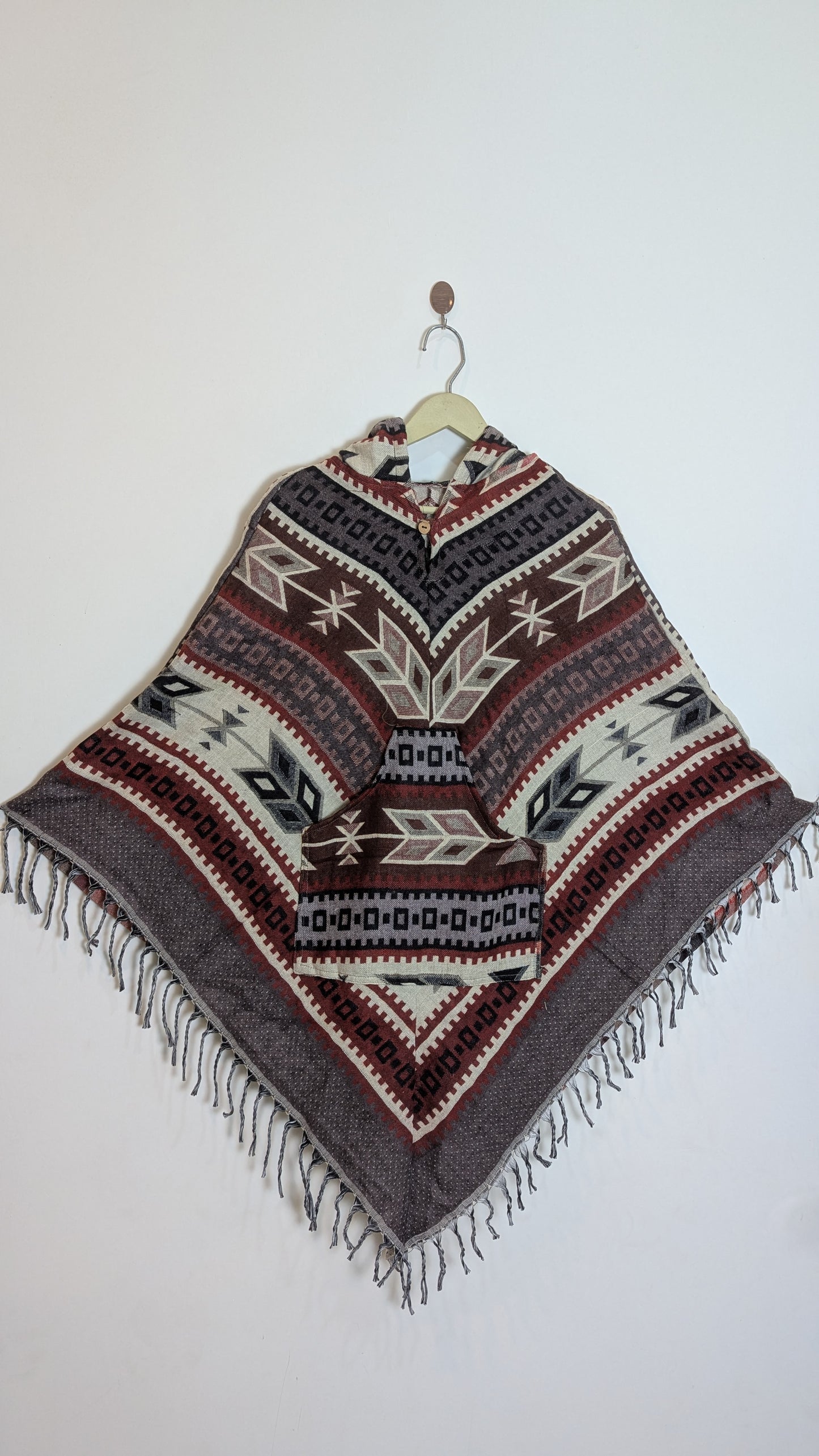 Women’s Ethno-Chic Geometric Woolen Poncho with Hood and Fringe Detail