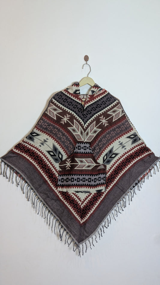 Women’s Ethno-Chic Geometric Woolen Poncho with Hood and Fringe Detail