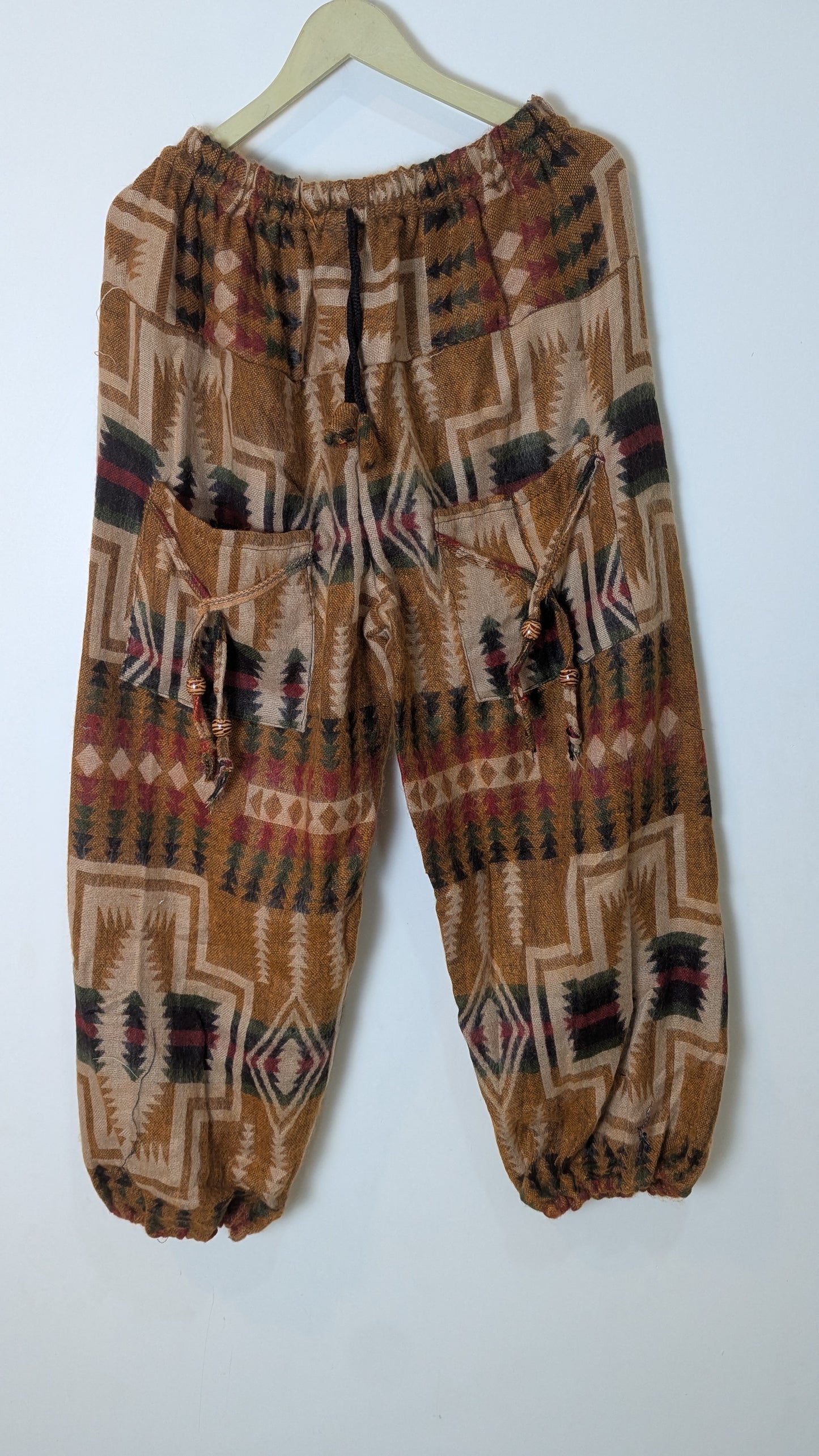 Mystic Meadow Woolen Harem Pants – Forest Green Floral & Tribal Fusion
