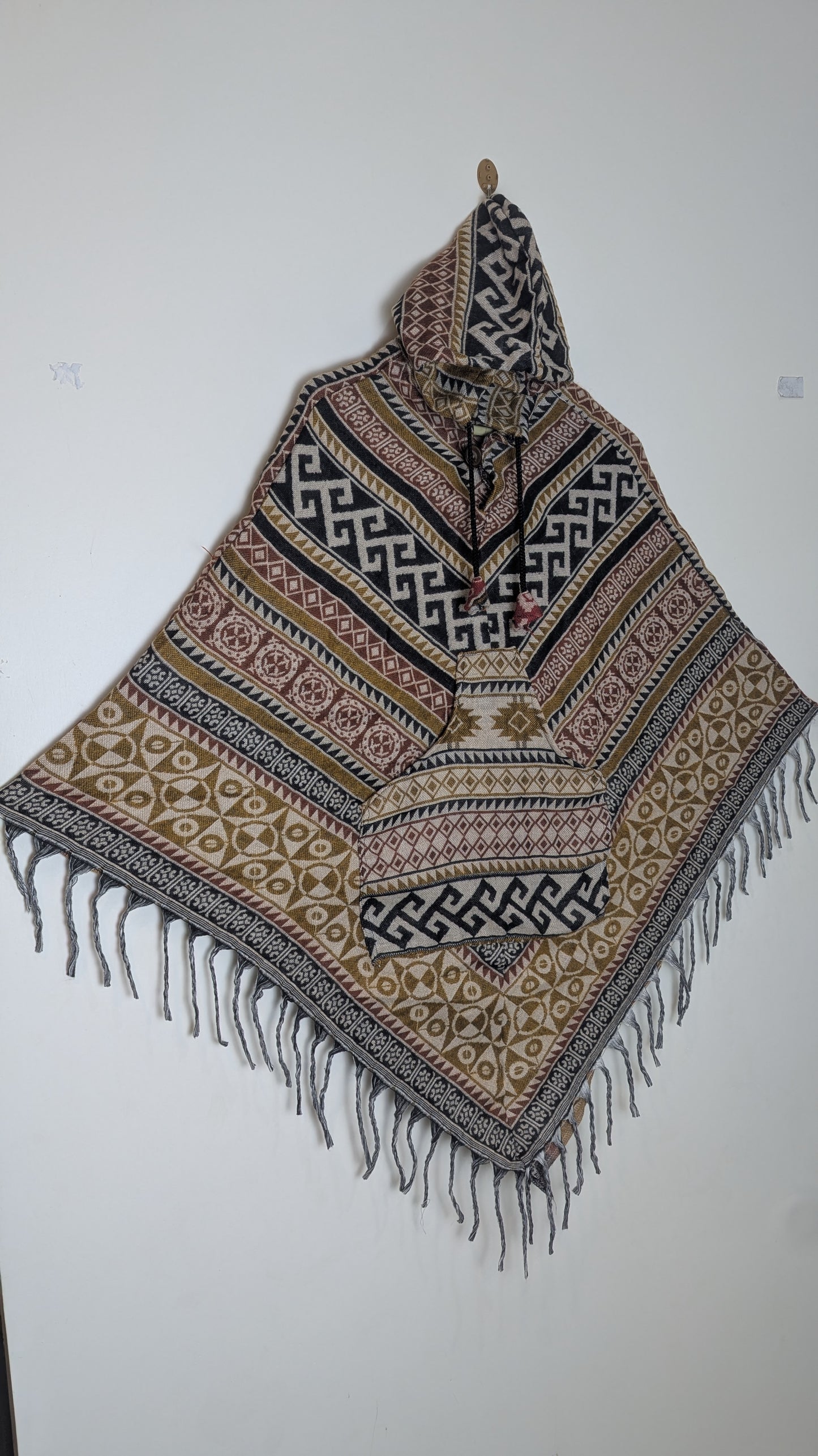 The Rishikesh Nomad: Earthy Geometric Hooded Poncho.
