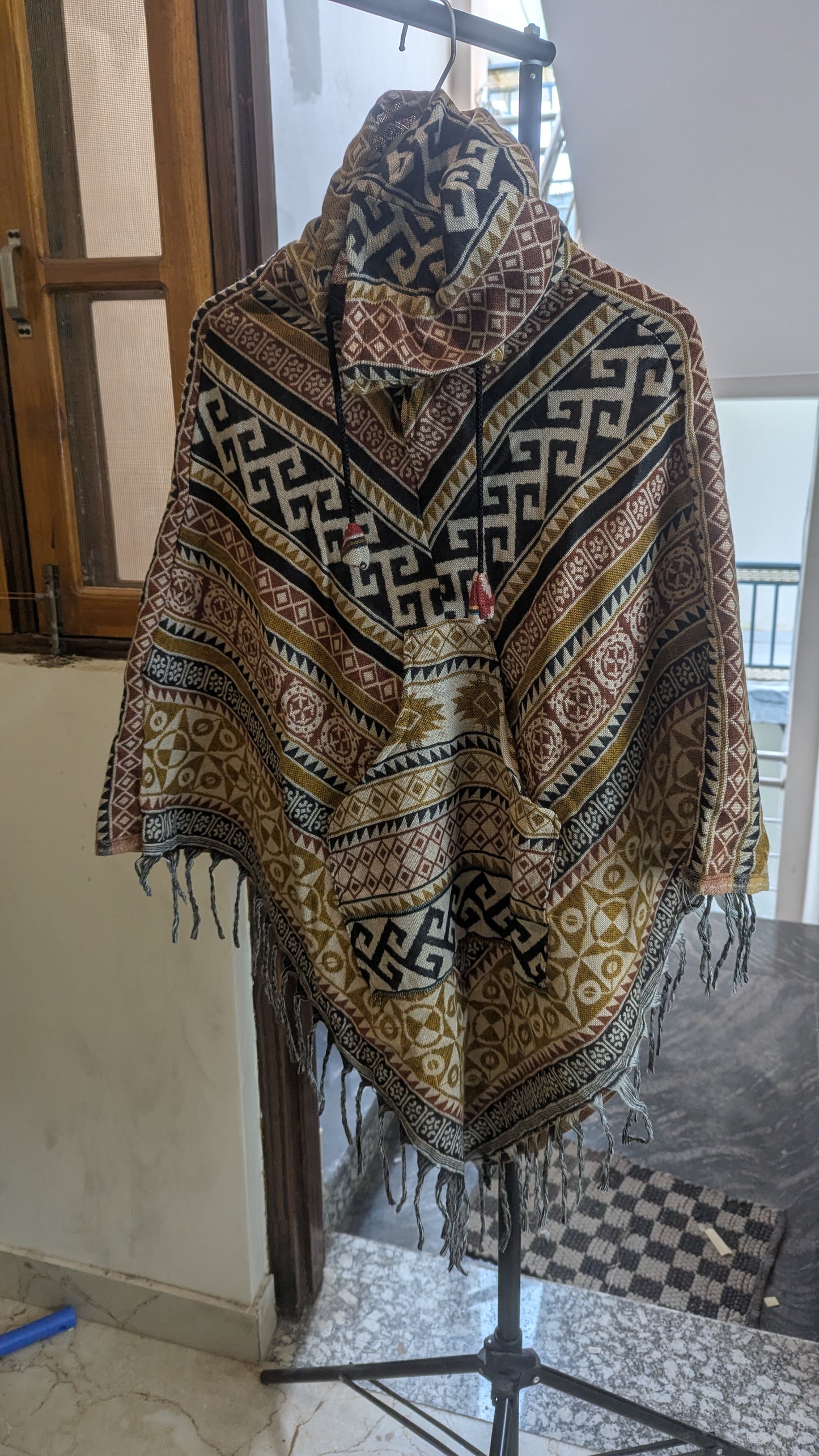The Rishikesh Nomad: Earthy Geometric Hooded Poncho.