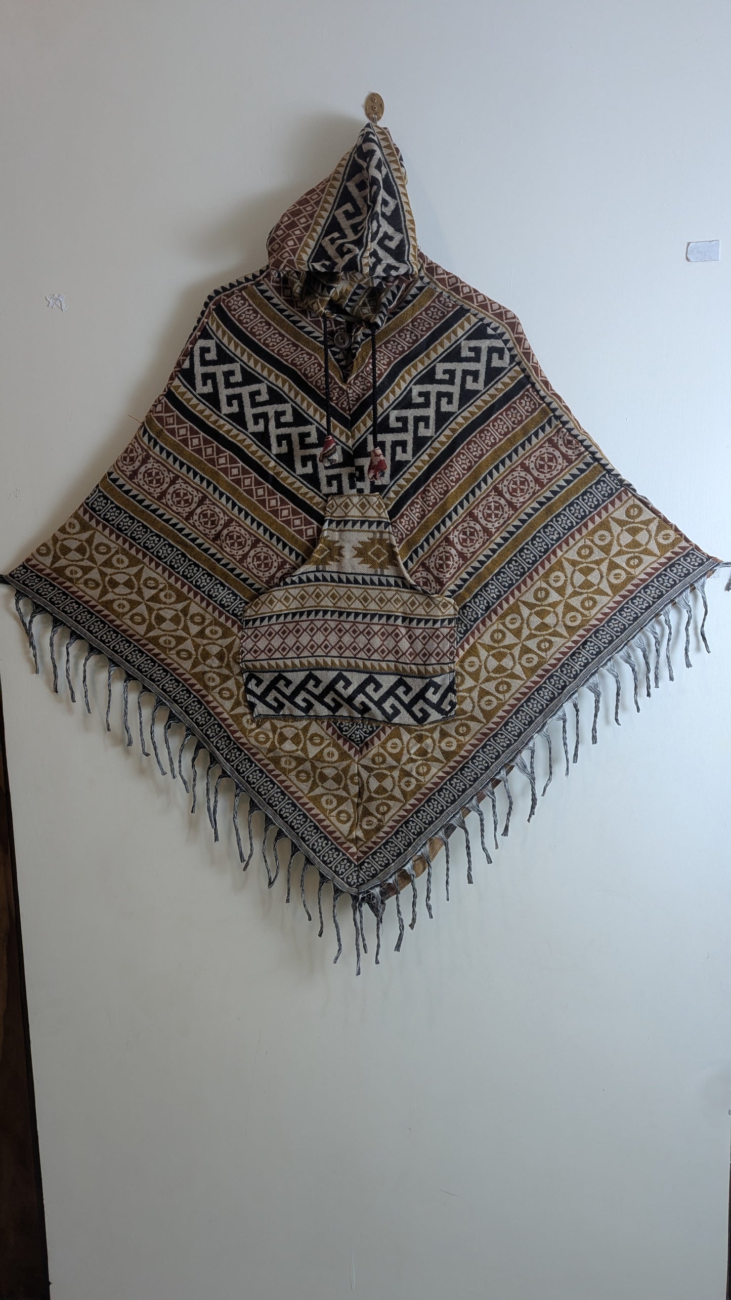 The Rishikesh Nomad: Earthy Geometric Hooded Poncho.